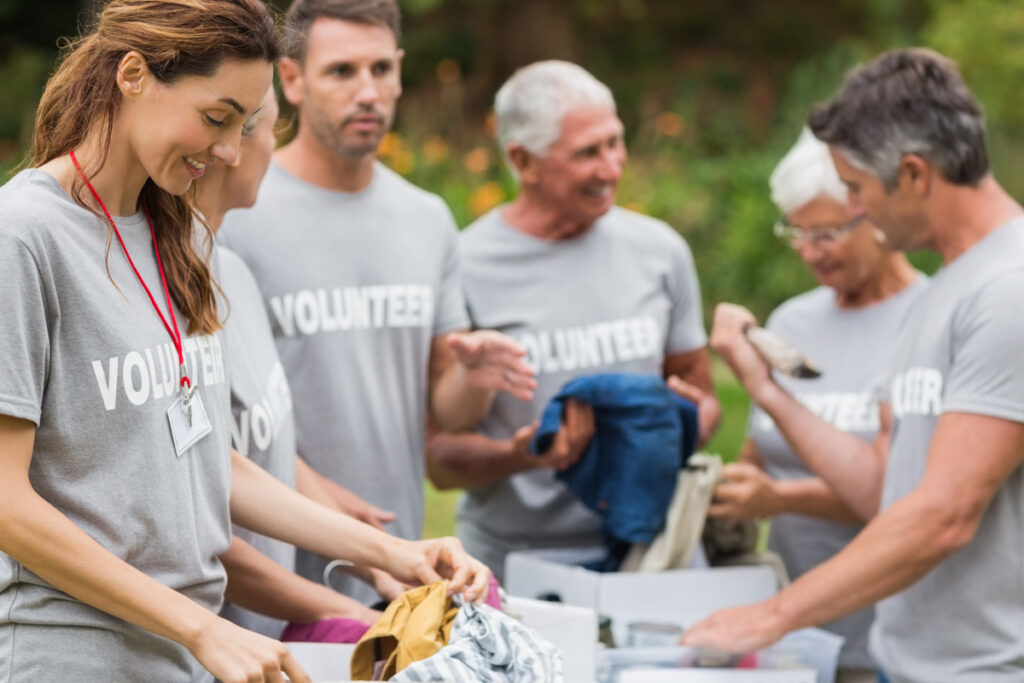 Volunteers collecting donations at a clothing drive