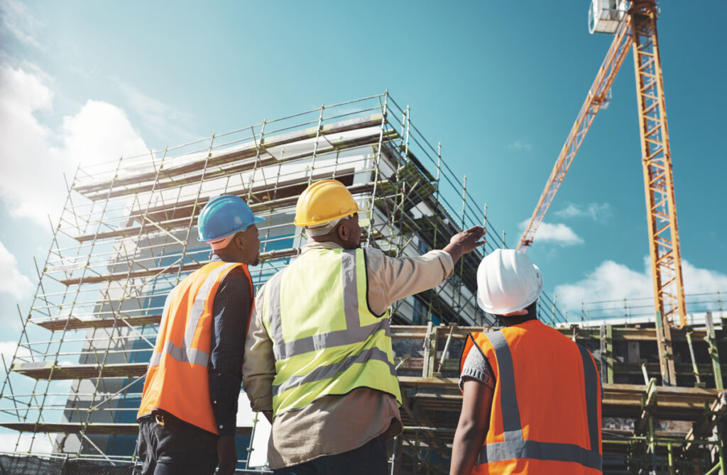 Construction team assessing project site